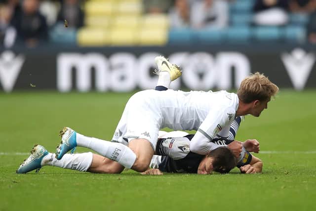 PITCHED BATTLE - Leeds United's game at Millwall might reflect the fractious nature of the atmosphere and Daniel Farke has attempted to prepare his team for the occasion. Pic: Getty