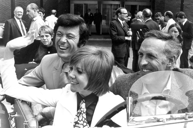 Cilla Black, Bruce Forsyth and Lionel Blair photographed in a car outside Yorkshire Television studios in June 1969.