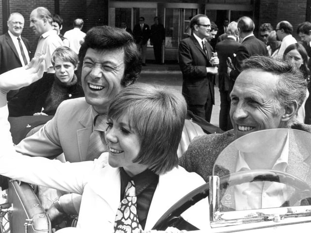 Cilla Black, Bruce Forsyth and Lionel Blair photographed in a car outside Yorkshire Television studios in June 1969.