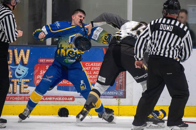 ARE YOU READY? Jordan Griffin goes toe to toe with Milton Keynes' Leigh Jamieson towards the end of the first period. Picture: Bruce Rollinson.
