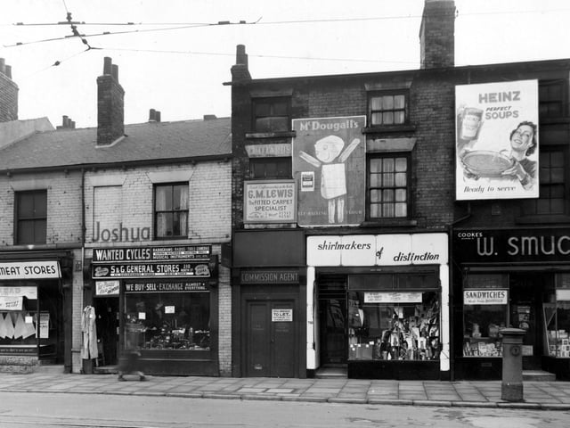 Shops on North Street in April 1955. Among them are; S and G General Stores; G.M. Lewis, Fitted Carpet Specialists and 'Shirtmakers Of Distinction'.