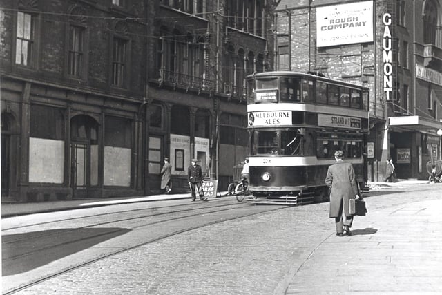 Tram no 204 travels route no 2 to Moortown Circular in March 1955. The Gaumont Theatre can be seen on left.