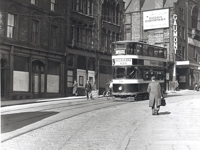 Tram no 204 travels route no 2 to Moortown Circular in March 1955. The Gaumont Theatre can be seen on left.