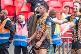 Tom Briscoe celebrates after touching down for Leigh in the Challenge Cup final. Another ex-Rhinos man, Matt Parcell, was among Hull KR's scorers. Picture by Allan McKenzie/SWpix.com.
