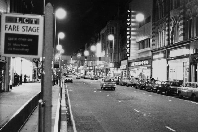 A night-time view of Briggate in November 1975.