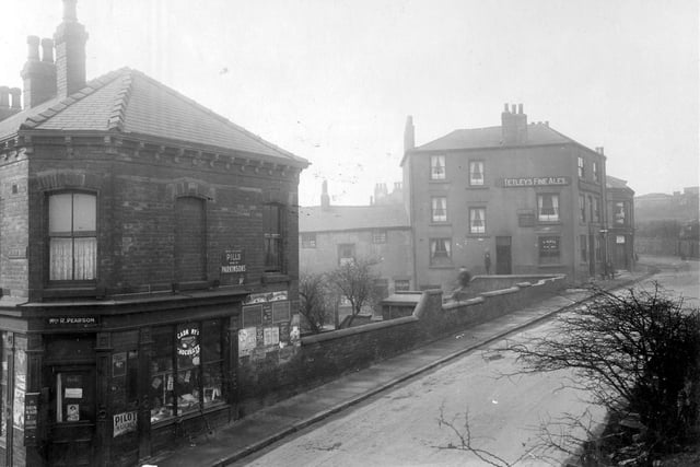 The junction with Buslingthorpe Lane, Tetleys' public house, the Skinners Arms, landlord Walter Watson. Shop, run by Mrs. R. Pearson, corner building. Enamel wall signs include 'Pilot' matches. 'Parkinsons' pills. Pictured in March 1930.