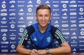 Max McFadden signs his first professional contract with Leeds United (Pic: Leeds United)