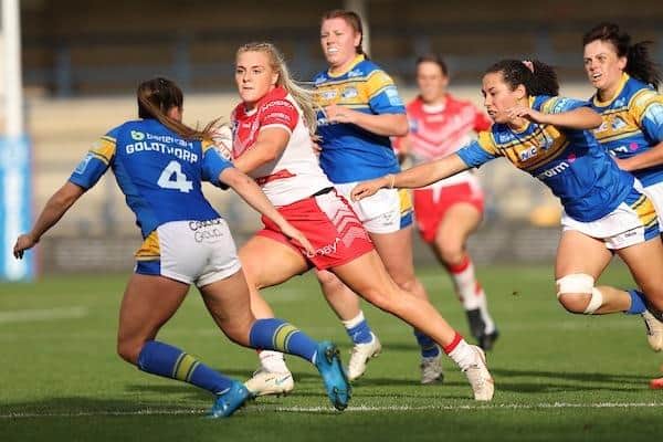 Rhinos' Fran Goldthorpe moves in to tackle Amy Hardcastle, then of St Helens, during last year's Super League semi-final at Headingley. Picture by John Clifton/SWpix.com.