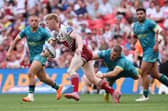 Jack Brown, of Hull KR, tackles Wigan's Zach Eckersley during last Saturday's Betfred Challenge Cup final. Picture by Alex Whitehead/SWpix.com.