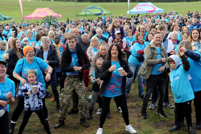 Participants limbering up for the Alzheimer's Society's Leeds Memory Walk at Temple Newsam.  (Picture: Steve Riding)