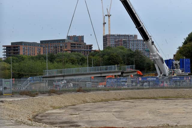 Spence Lane footbridge is being removed by one of the world’s most powerful all terrain cranes. Picture: Steve Riding