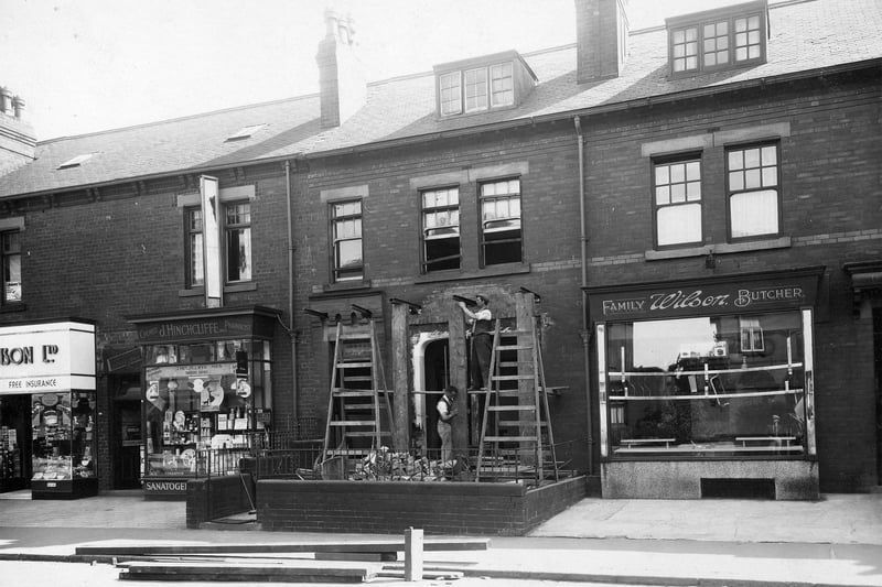 A row of shops on Austhorpe Road in July 1935 with Wilson family butchers in focus.