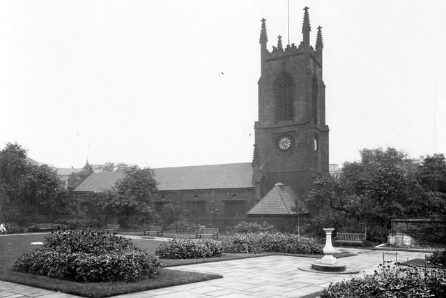 Merrion Street Rest Garden, opened in 1933, a gift to the city from Thomas Wade's Charity. A sundial can be seen in the garden. St. Johns Church, built by John Harrison acts as a boundary to the garden. Pictured in September 1937.