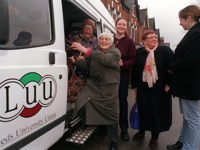 Leeds Student Community Action volunteers, Joanne Lee (left) and Nicki Clapshaw help pensioners Rosa Hawkins (left) and Doreen Cole from Burley into the minibus at the start of a shopping trip in January 1999.