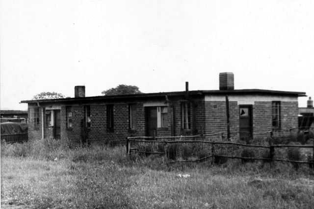 A MAP bungalow located on the Westfield estate in 1955. This is an example of the temporary homes which were erected in the Yeadon area to provide accommodation for people working at the AVRO Company. MAP (Ministry of Aircraft Production) brought in many workers to boost production. AVRO Lancasters and AVRO Ansons were two of the types of Aircraft which were built in Yeadon. This view of property prior to demolition.