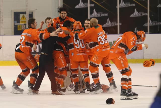 MAGIC MOMENT: Sheffield Steeldogs' players celebrate their NIHL National Cup final win in overtime against Leeds Knights. Picture: Cerys Molloy/Steeldogs Media.
