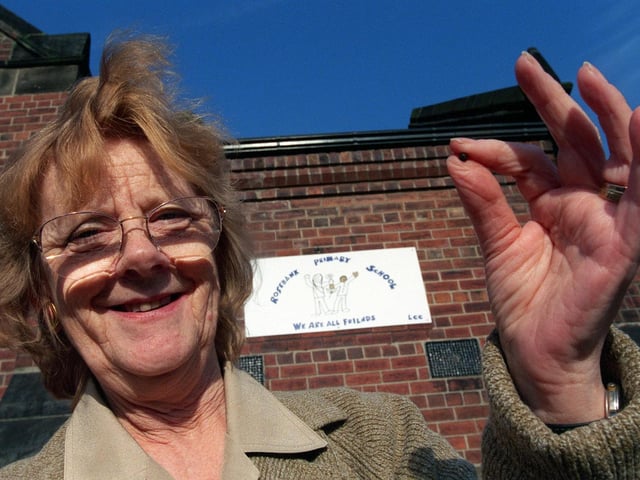 Freda Matthews, chair of the Rosebank Trust, holds the yearly rent for Rosebank, a piece of wasteland behind Rosebank Primary which was being leased to the Trust for a 'peppercorn rent'. The rent was handed over during a document signing at the school in October 1998.