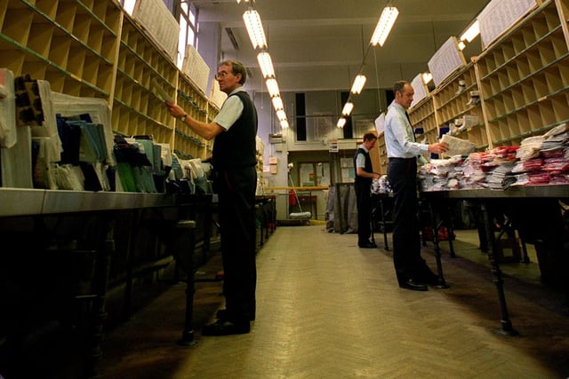Postmen sorting letters at Moortown delivery office in January 1997.