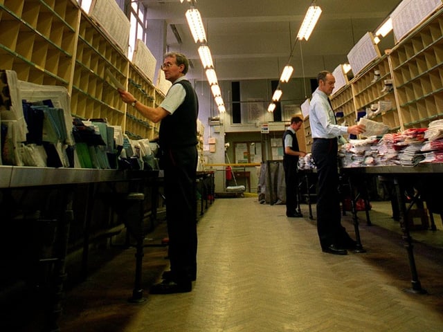Postmen sorting letters at Moortown delivery office in January 1997.