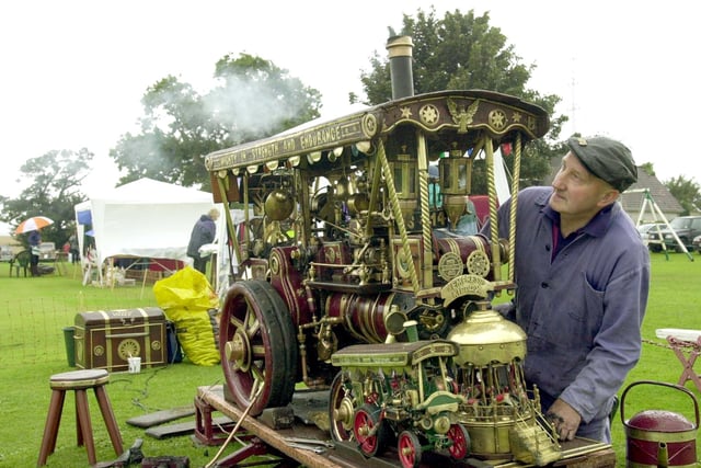 Kippax's Arthur Boothroyd with his home made  'Empress of Kippax'  miniature showman's engine a quarter size of the original. He finished it  in 1987 made from scrap metal and other odds and ends and was displaying it at Ledsham Fayre in September 2000.