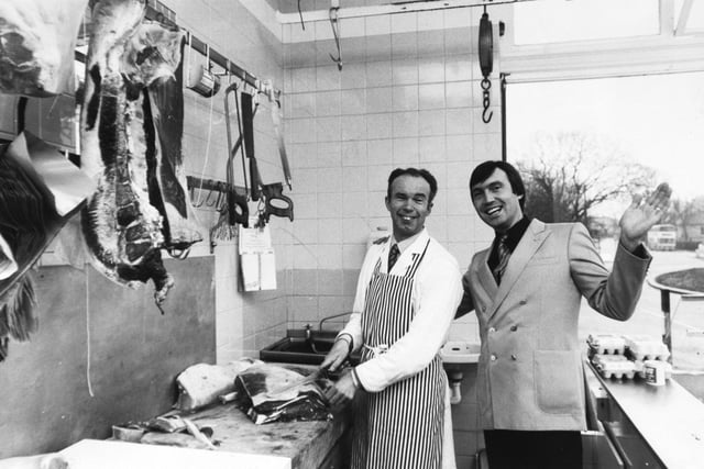 Jack Myers in his Moortown butcher's shop with market trader Rod Brown in March 1984.