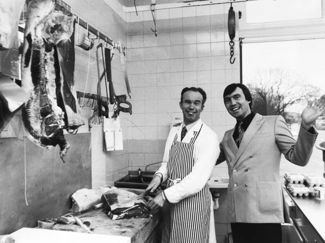Jack Myers in his butcher's shop with market trader Rod Brown in March 1984.