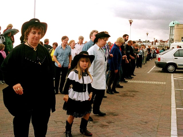 Bridlington Promenade was the location for a world record attempt for the longest line dance in October 1999. Pictured putting her best foot forward is young Sarah Foster.