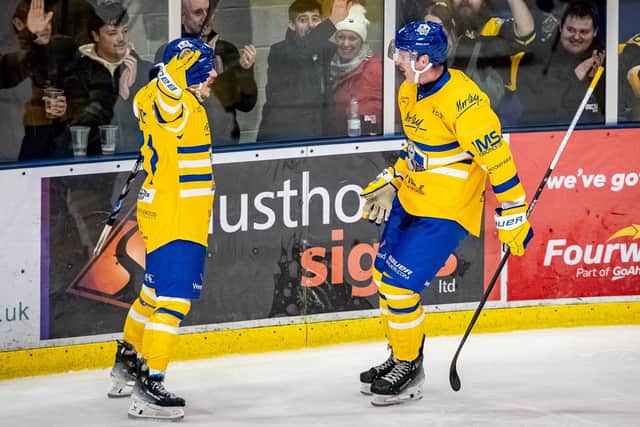 FIRST UP: Sam Dunn (right) celebrates his first goal for Leeds Knights with Oli Endicott during Saturday's win over Peterborough . Picture: Ben Gordon/Knights Media.