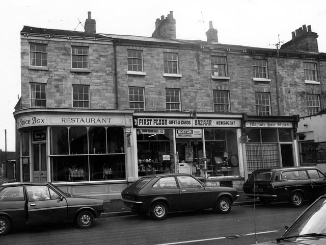 Boston Spa High Street in March 1980 showing no.152 The Spice Box restaurant, no.150 Boston Office Supplies and no.148 Mayfair Hair Styles.