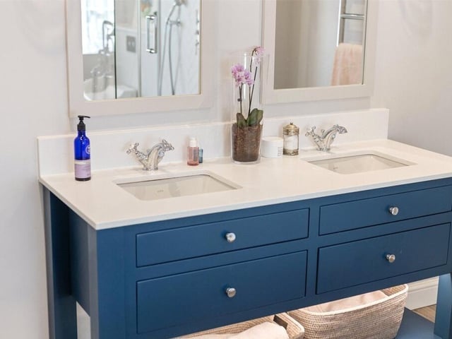 Twin basins bring elegance and everyday convenience to the master bedroom ensuite.