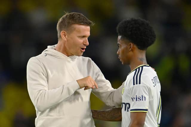 LEEDS, ENGLAND - AUGUST 24: Jesse Marsch, Manager of Leeds United speaks to Crysencio Summerville of Leeds United after the Carabao Cup Second Round match between Leeds United and Barnsley at Elland Road on August 24, 2022 in Leeds, England. (Photo by Clive Mason/Getty Images)