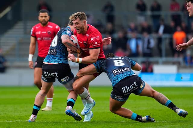 Jack Ormondroyd on the attack for Salford Red Devils against Leigh Leopards last season. Picture by Olly Hassell/SWpix.com.