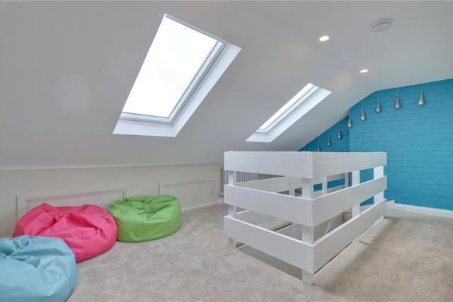 A bright and airy landing with Velux skylights to the front elevation and useful eaves storage, with doors to two further bedrooms and another bathroom.