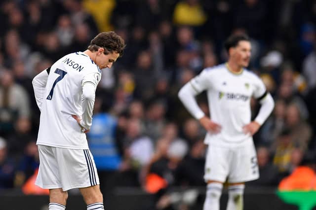Leeds United's US midfielder Brenden Aaronson (L) and Leeds United's German defender Robin Koch (R) have both gone on loan following relegation (Photo by OLI SCARFF/AFP via Getty Images)