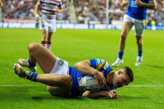 James Bentley scores the first of his two tries in Rhinos' semi-final defeat of Wigan. Picture by Bruce Rollinson.