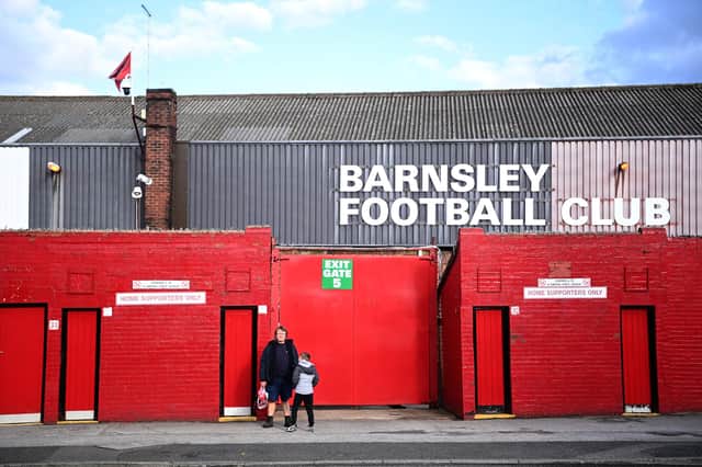 BARNSLEY, ENGLAND - MAY 17: Barnsley fans wait outside the stadium prior to the Sky Bet Championship Play-off Semi Final 1st Leg match between Barnsley and Swansea City at Oakwell Stadium on May 17, 2021 in Barnsley, England. A limited number of fans will be allowed into the stadium as Coronavirus restrictions begin to ease in the UK following the COVID-19 pandemic. (Photo by Laurence Griffiths/Getty Images)