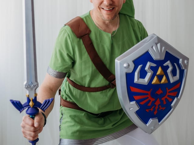 Jonny holding sword and shield from famous Zelda video games
