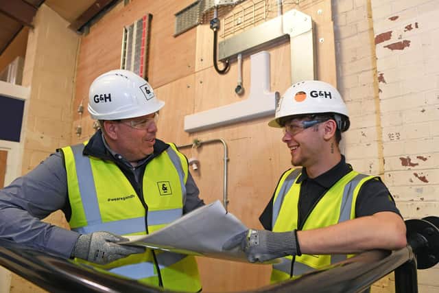 G&H development manager Paul Churchill with apprentice Callum Barry in the new training facility.