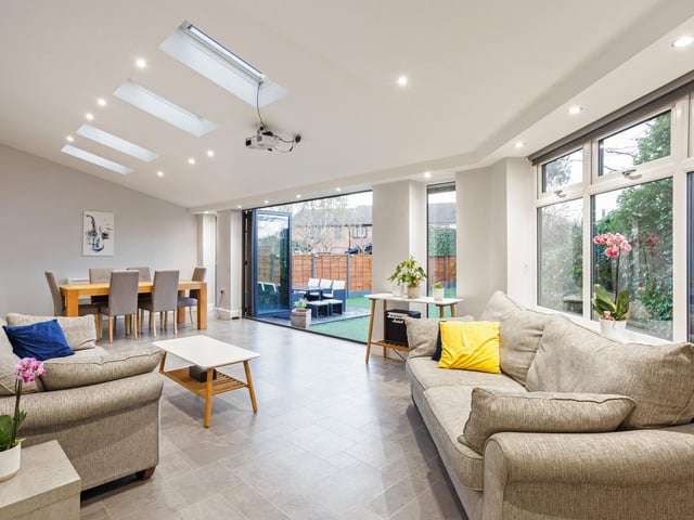 The house has excellent kerb appeal from the road side, with a private gated driveway to the front, and internally there are a range of desirable features such as Karndean engineered wood flooring and underfloor heating, bifold doors to the rear garden, a striking picture window to the front and a stunning refitted kitchen.
