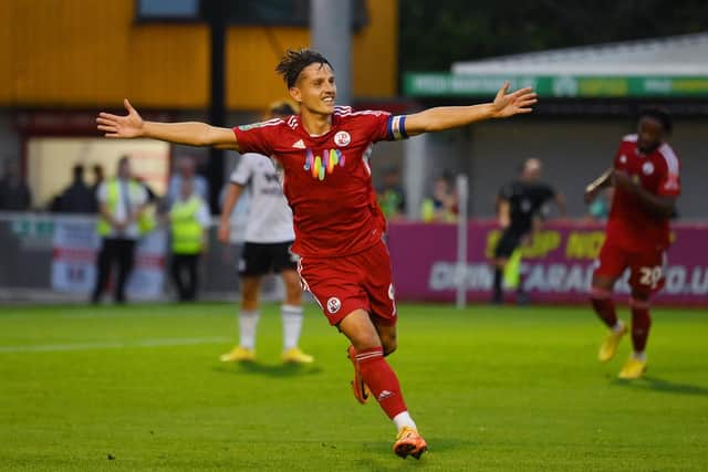 CRAWLEY, ENGLAND - AUGUST 23: Tom Nichols of Crawley Town celebrates after scoring their team's first goal during the Carabao Cup Second Round match between Crawley Town and Fulham at Broadfield Stadium on August 23, 2022 in Crawley, England. (Photo by Mike Hewitt/Getty Images)