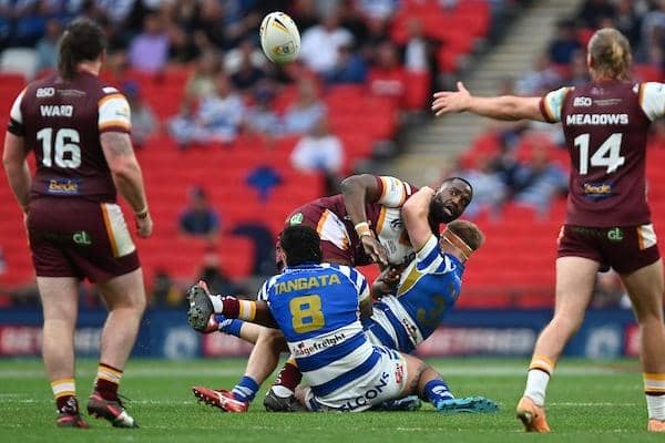 Samy Kibula (middle) in action for Batley during this year's 1895 Cup final at Wembley. Picture by Matthew Merrick/SWpix.com.
