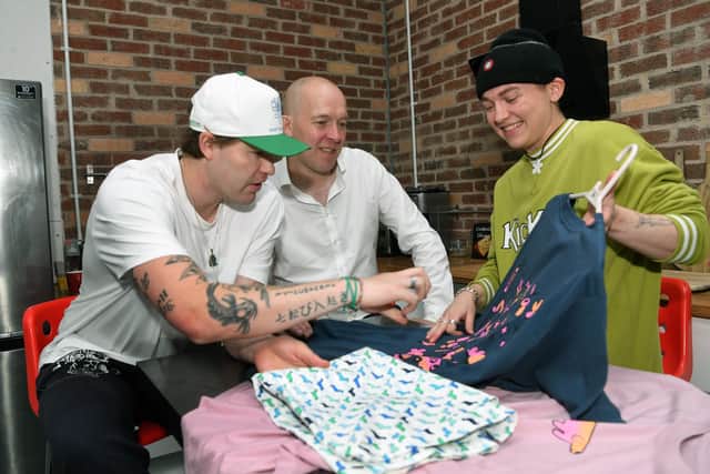 Pictured: Harry Campbell (centre) at clothing company Common Sense, with designers Joshua Van Leader (left) and Parker Chapman.