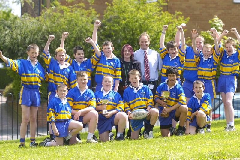 Pupils celebrate after winning the Leeds & Hunslet Schools Rugby Tournament in May 2005. Pictured, back row from left, are Blake Banning, Dominic Williams, Dale Evans, Jason Thackray, Charlotte Emery (Head of Year7), Ian Orum (coach), Liam Hayes, Dan Martell, James Brown and Craig Stephenson, Front row, from left, are Chris Rhodes, Jordan Clarke, Paul Clarke (captain), Danny Harrison, Aiden Veira and Callam Macduff.