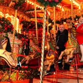 The old Lord Mayor of Leeds, Councillor Jane Dowson, enjoying the merry go round with Kurt Stroscher at the Leeds German Christmas Market back in 2017.