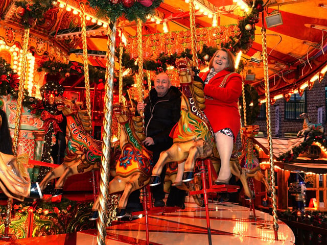 The old Lord Mayor of Leeds, Councillor Jane Dowson, enjoying the merry go round with Kurt Stroscher at the Leeds German Christmas Market back in 2017.