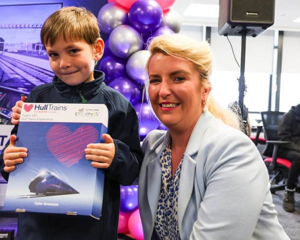 Six-year-old Tyler Grannon meets Shadow Transport Secretary Louise Haigh.