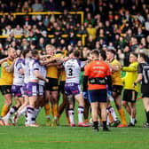 Players clash during Castleford Tigers' Easter loss to Wakefield Trinity. Picture by Alex Whitehead/SWpix.com.