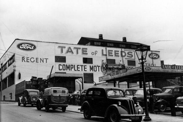 Did you buy a car from here back in the day? Tate of Leeds Ltd., Ford Motor dealers and servicing, on New York Road in Leeds city centre pictured in May 1955.