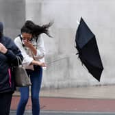 People battle through the wind and rain as Storm Francis arrives in Leeds City Centre...25th August 2020..Picture by Simon Hulme