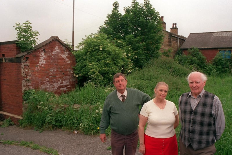 Community campaigners Harry Bedford, Jean Webster and John Holl are pictured by the waste land at the back of the old toilets in Rothwell.